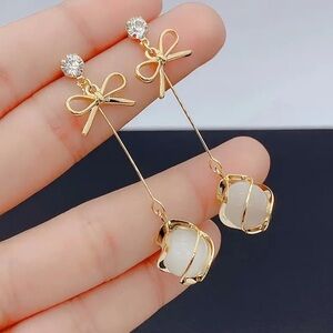 Elegant Minimalist Long Earrings with Glass Beads and Bow Design. Drop Earrings